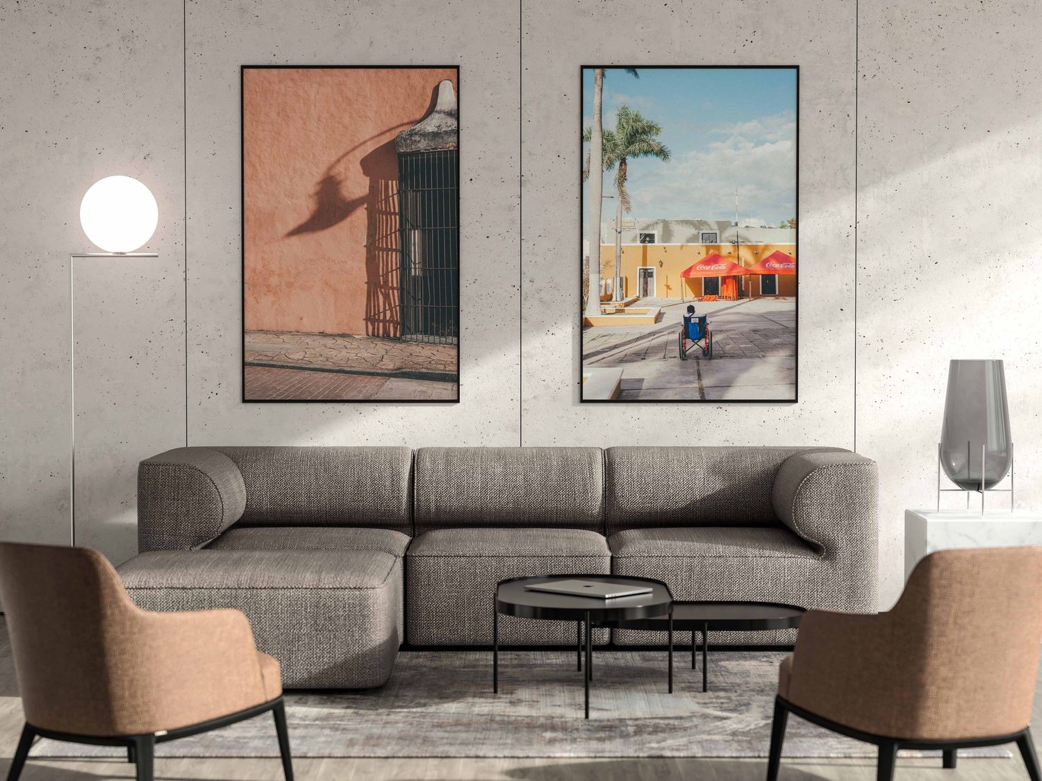 Modern living room with gray sofa, two framed urban photography prints, and warm neutral decor.