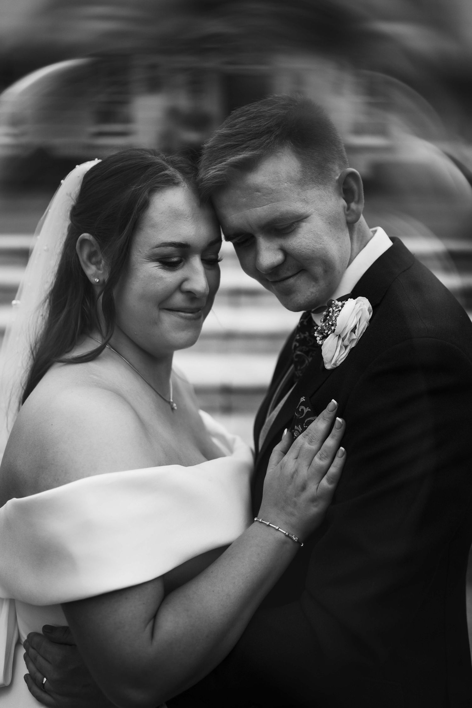 Black and white portrait of a bride and groom sharing a tender embrace, foreheads touching. Irish wedding photography. Dunboyne Castle