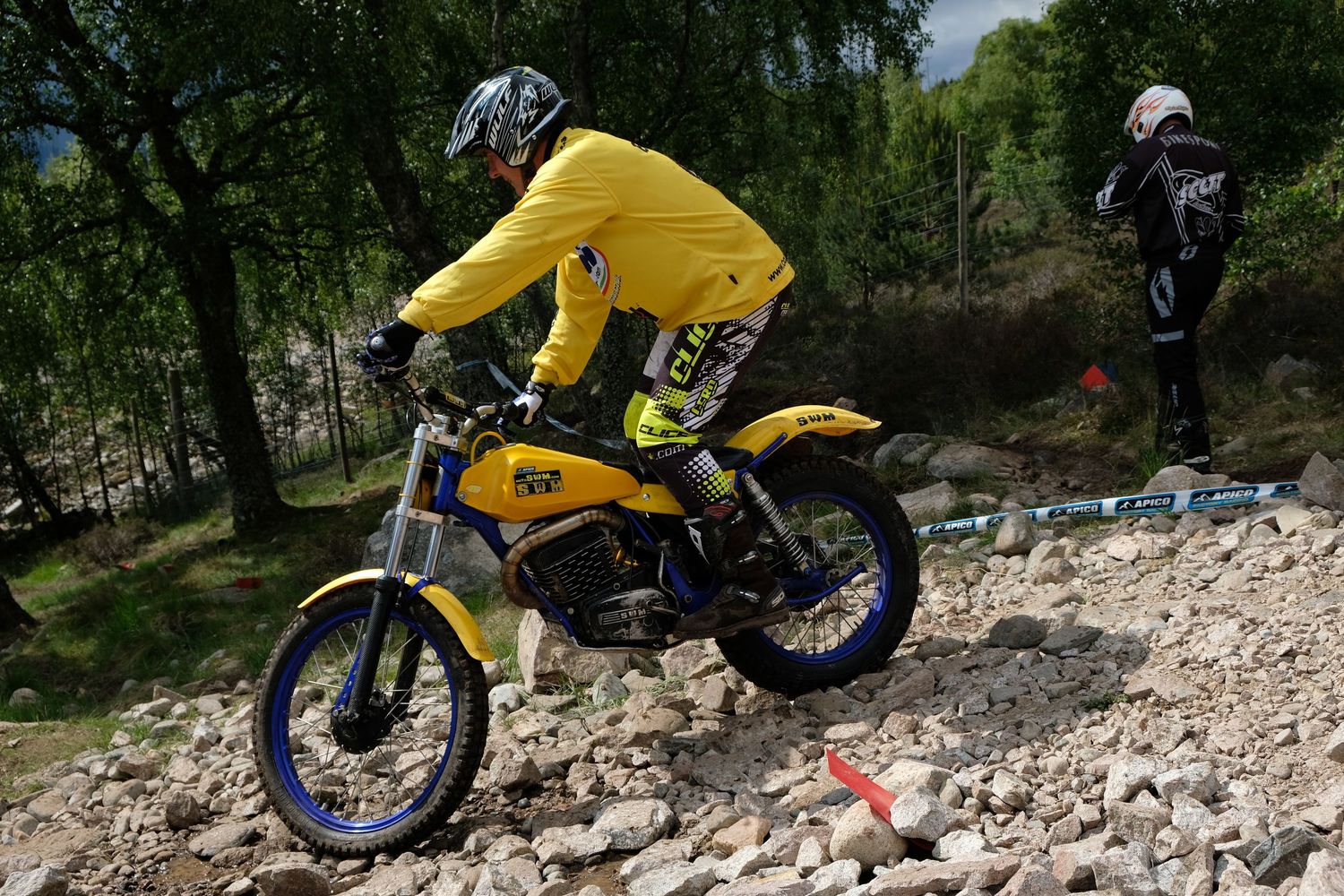 Man on a SWM trials motorbike at Aviemore in Scotland.