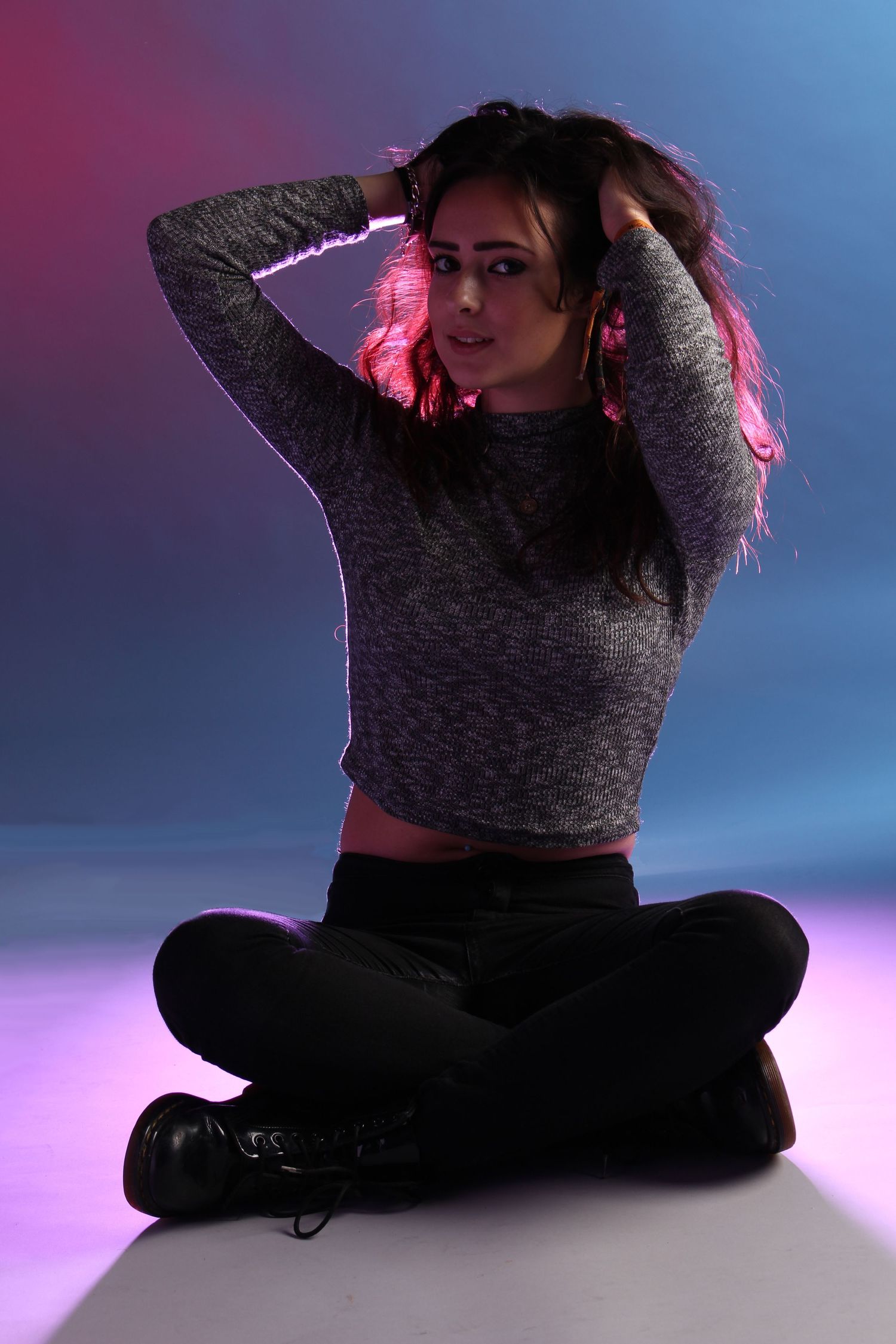 Girl posing in a studio.