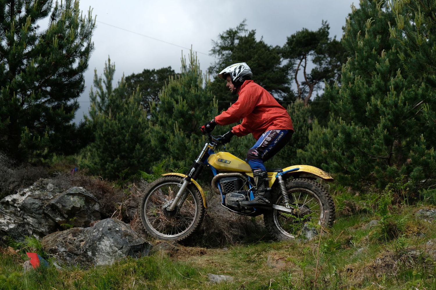 Man on a SWM trials motorbike at Aviemore in Scotland.