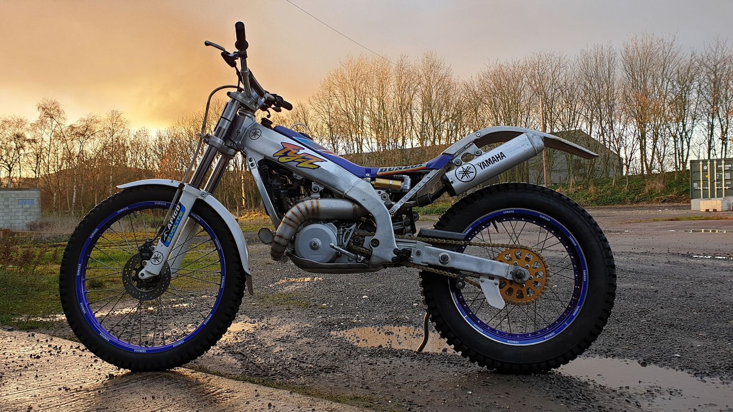 Sunset photo of a two stroke TYZ motorbike.