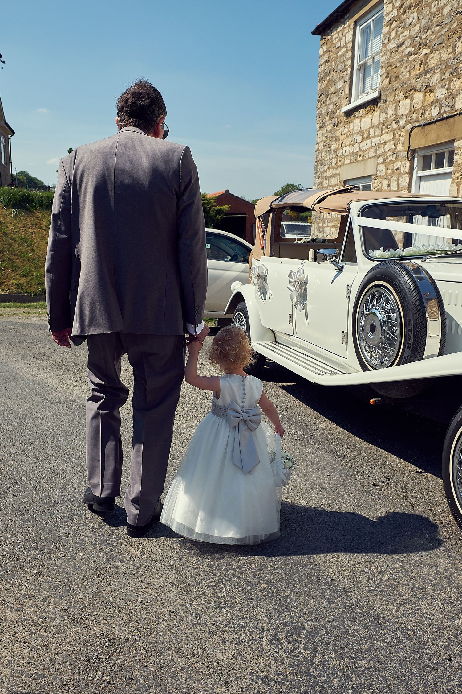 Flower girl with the Brides Father.