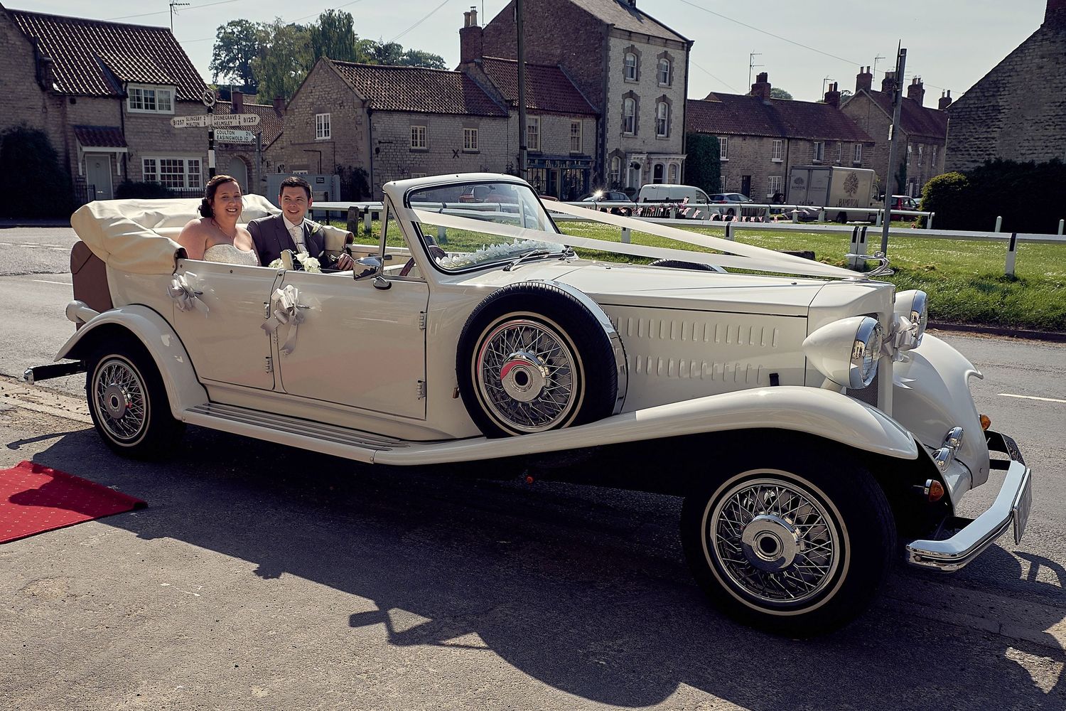 Bride and Groom arriving their car at their Reception venue.