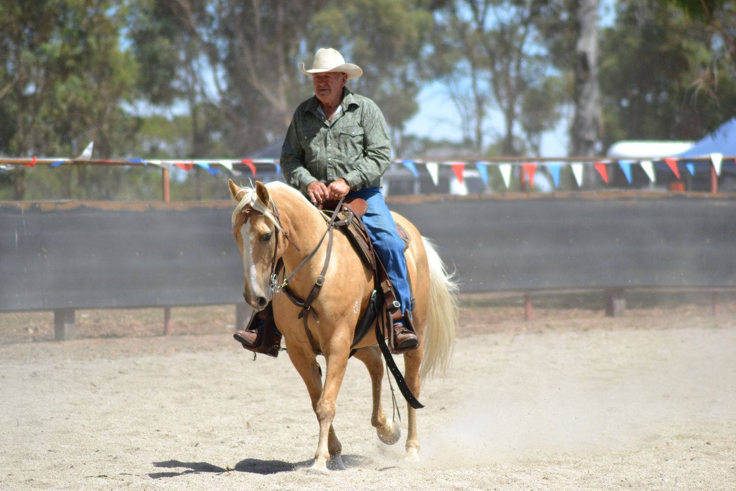 Campdraft rider competing on horseback during a cattle event in Western Australia.