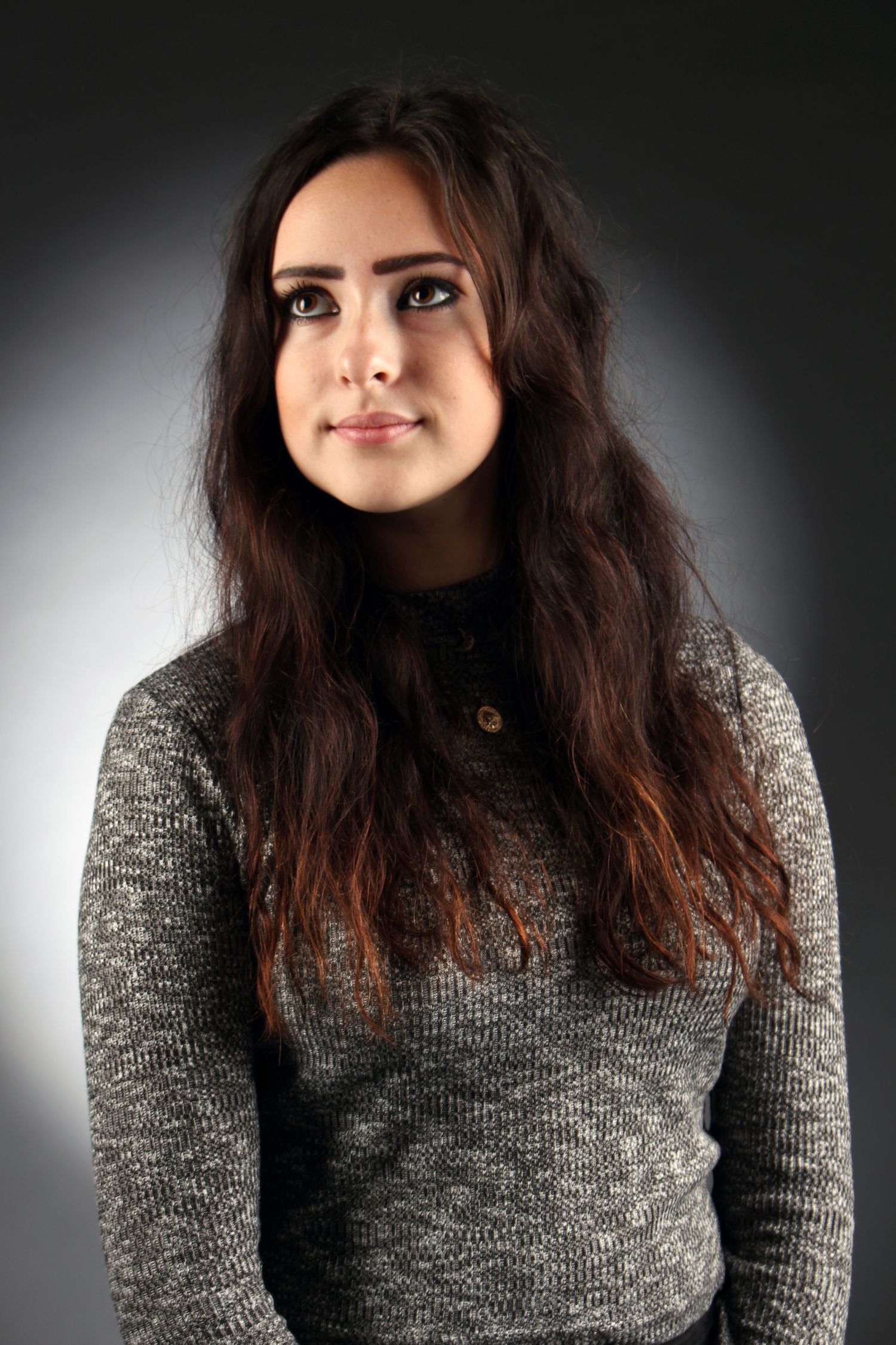 Studio shot of girl posing with lighting.