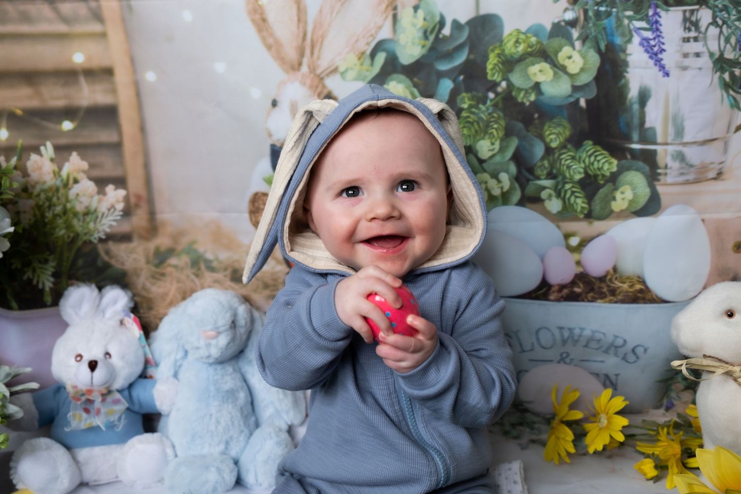 Child enjoying an Easter-themed spring photoshoot.