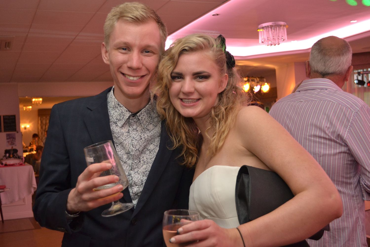 Shot of 2 guests at a suprirse 50th birthday party.