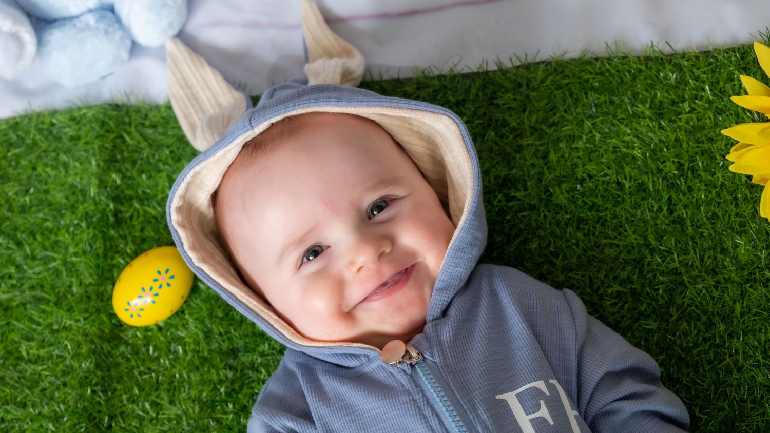 Child enjoying an Easter-themed spring photoshoot.