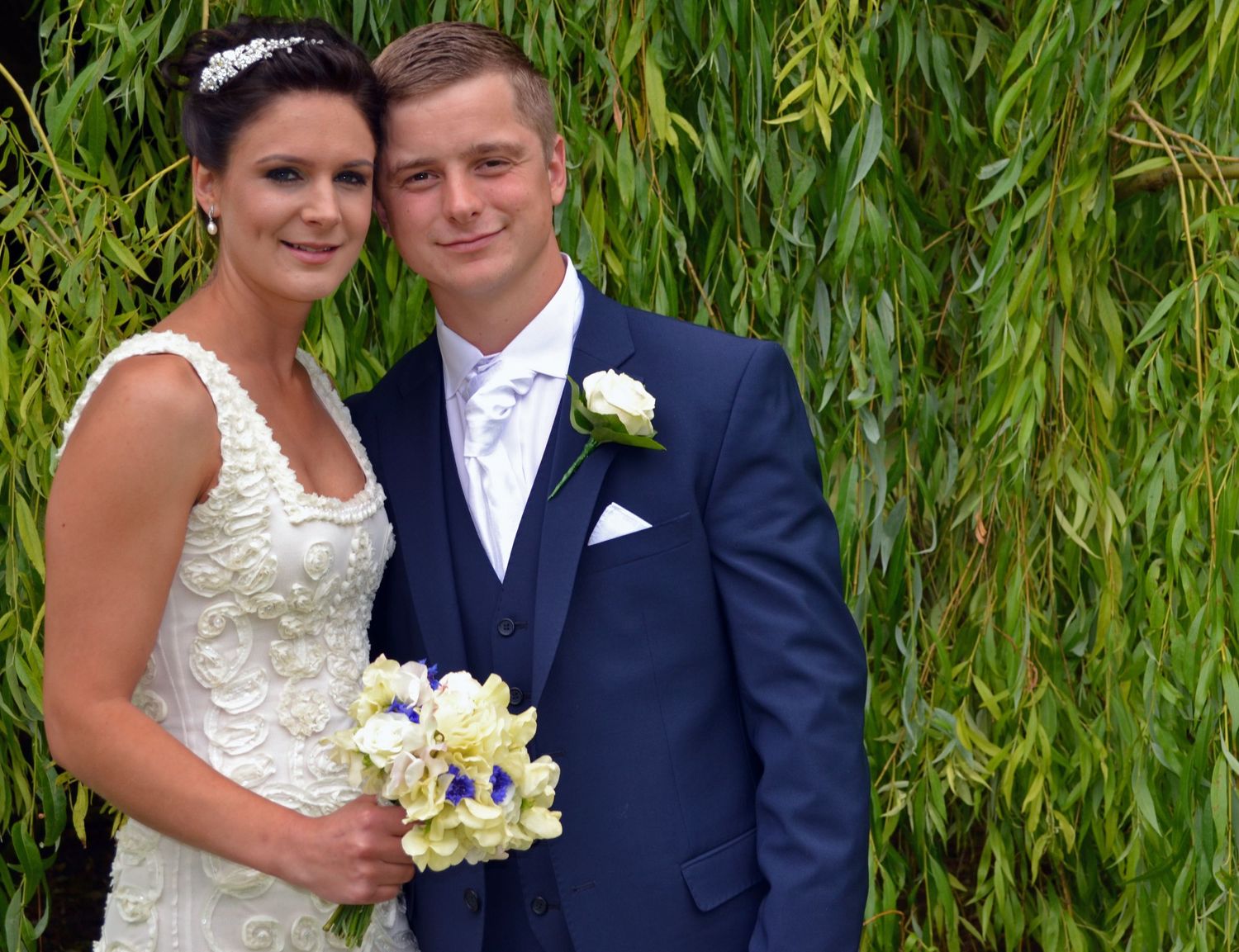 Couple shots in the wedding venue garden.
