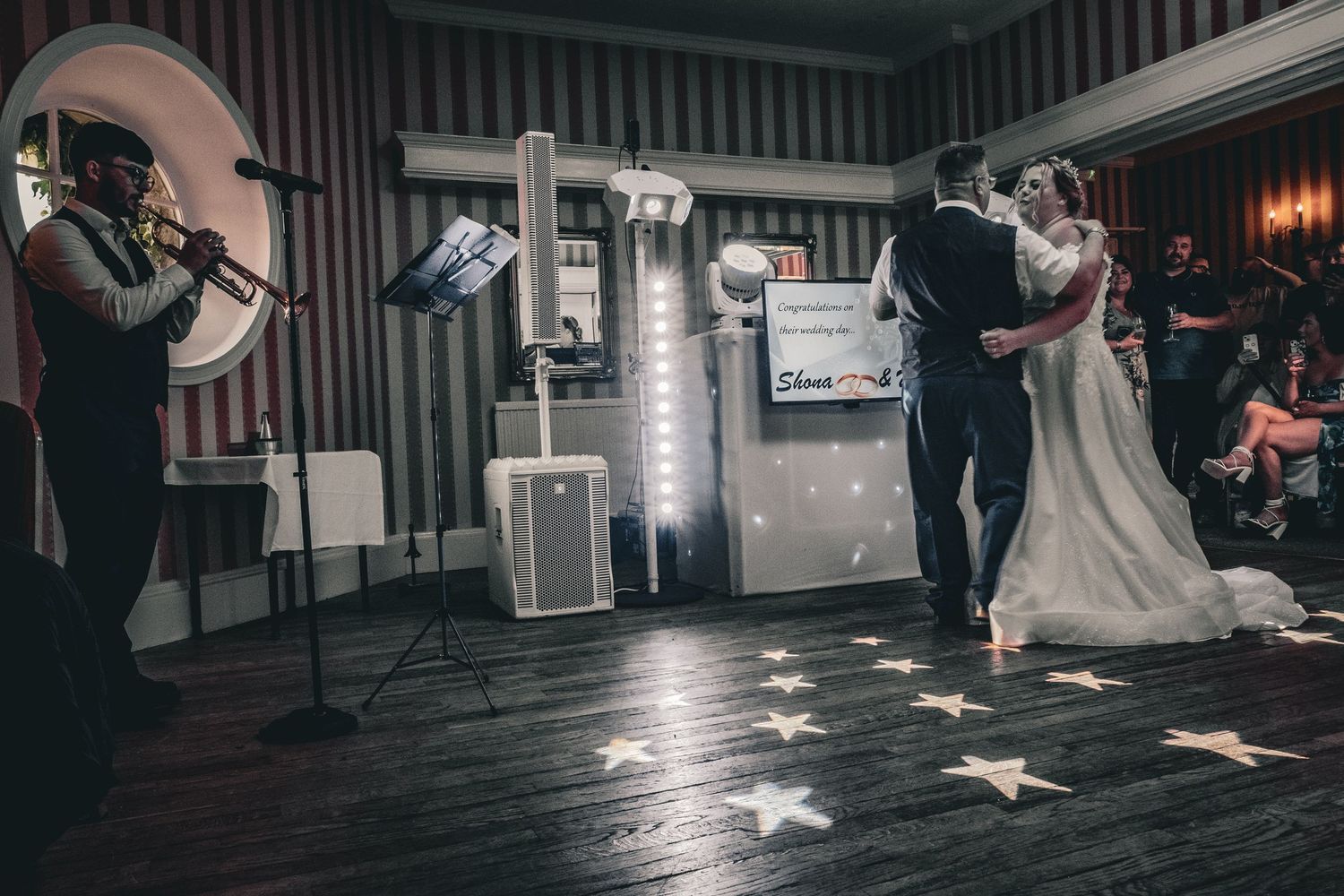 Couple sharing their first dance during the evening reception.