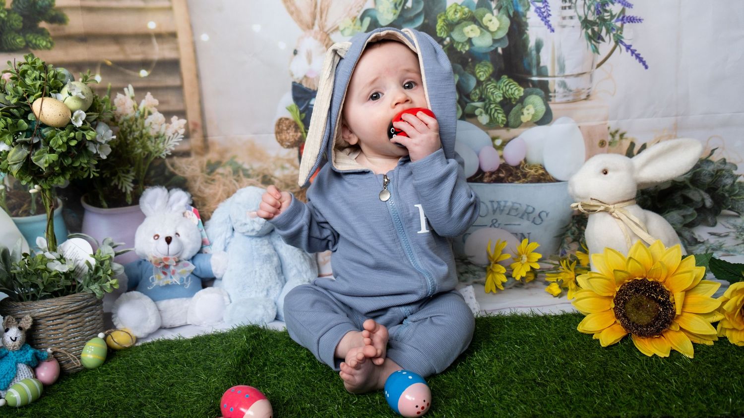 Child enjoying an Easter-themed spring photoshoot.