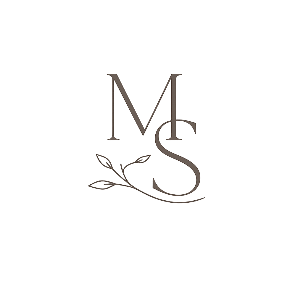 Minimalist MS monogram logo with decorative leaf branch accent in taupe tones.