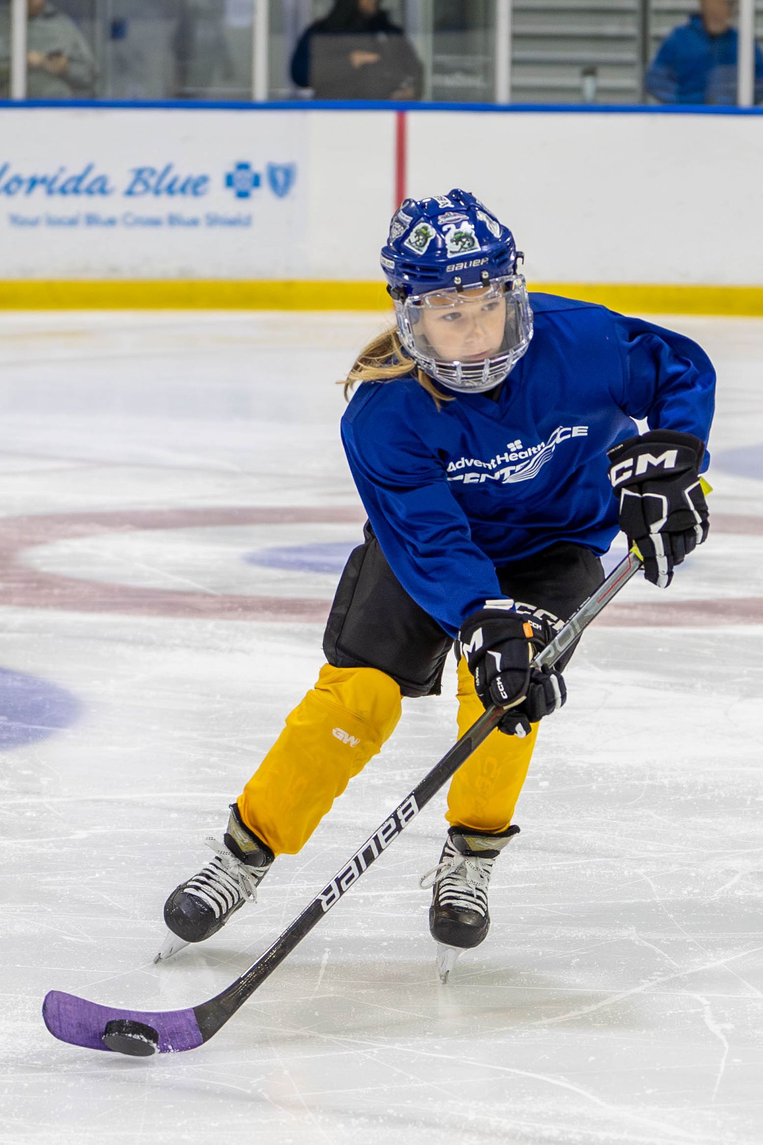 Orlando sports action photographer K-Mo Snaps capturing a youth ice hockey game