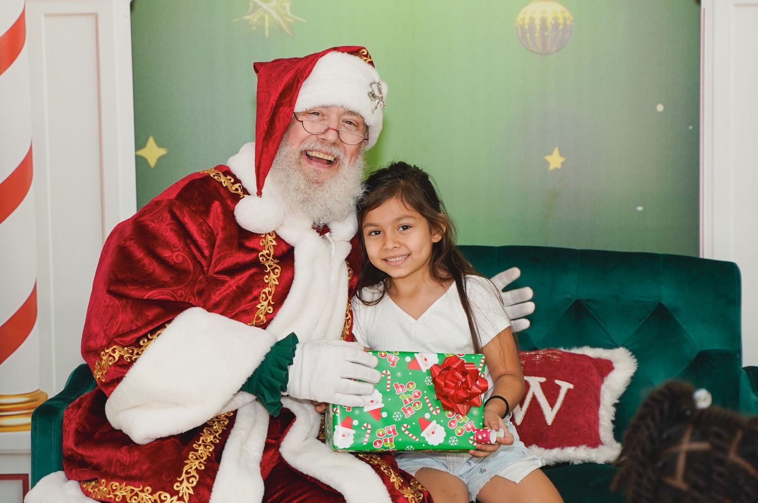 Orlando event photographer K-Mo Snaps capturing a Christmas party with Santa.