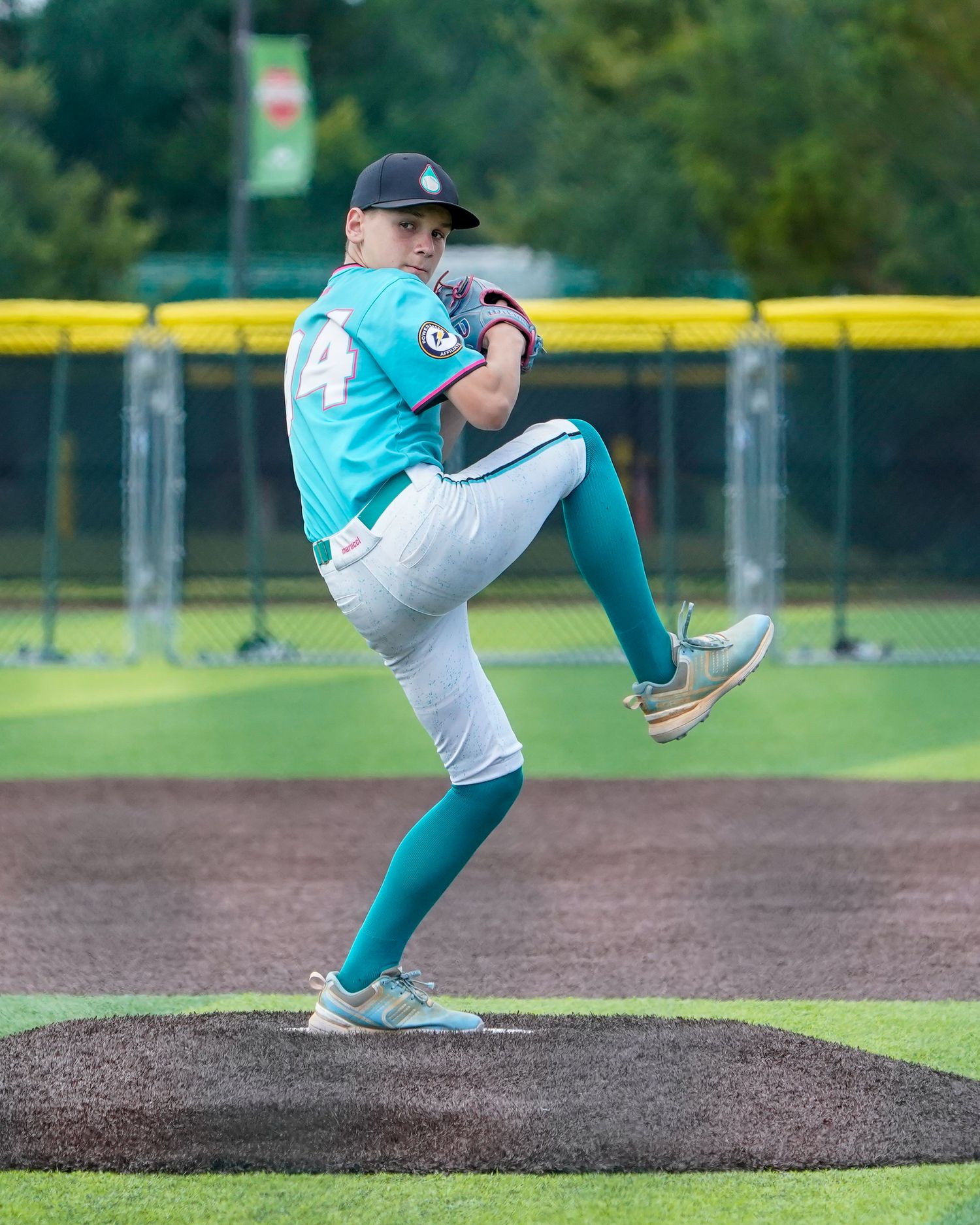 Orlando sports action photographer K-Mo Snaps capturing Orlando Drip 12U pitcher at a Perfect Game tournament