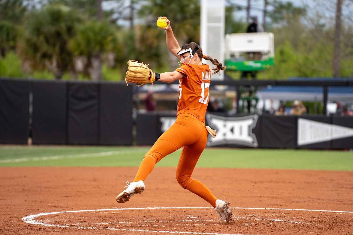 Orlando sports action photographer K-Mo Snaps capturing a pitcher from the University of Texas while visiting Orlando against UCF Knights