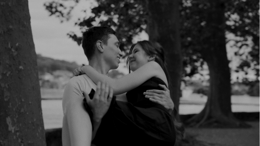 Black and white couple of lovers in front of Annecy's lake