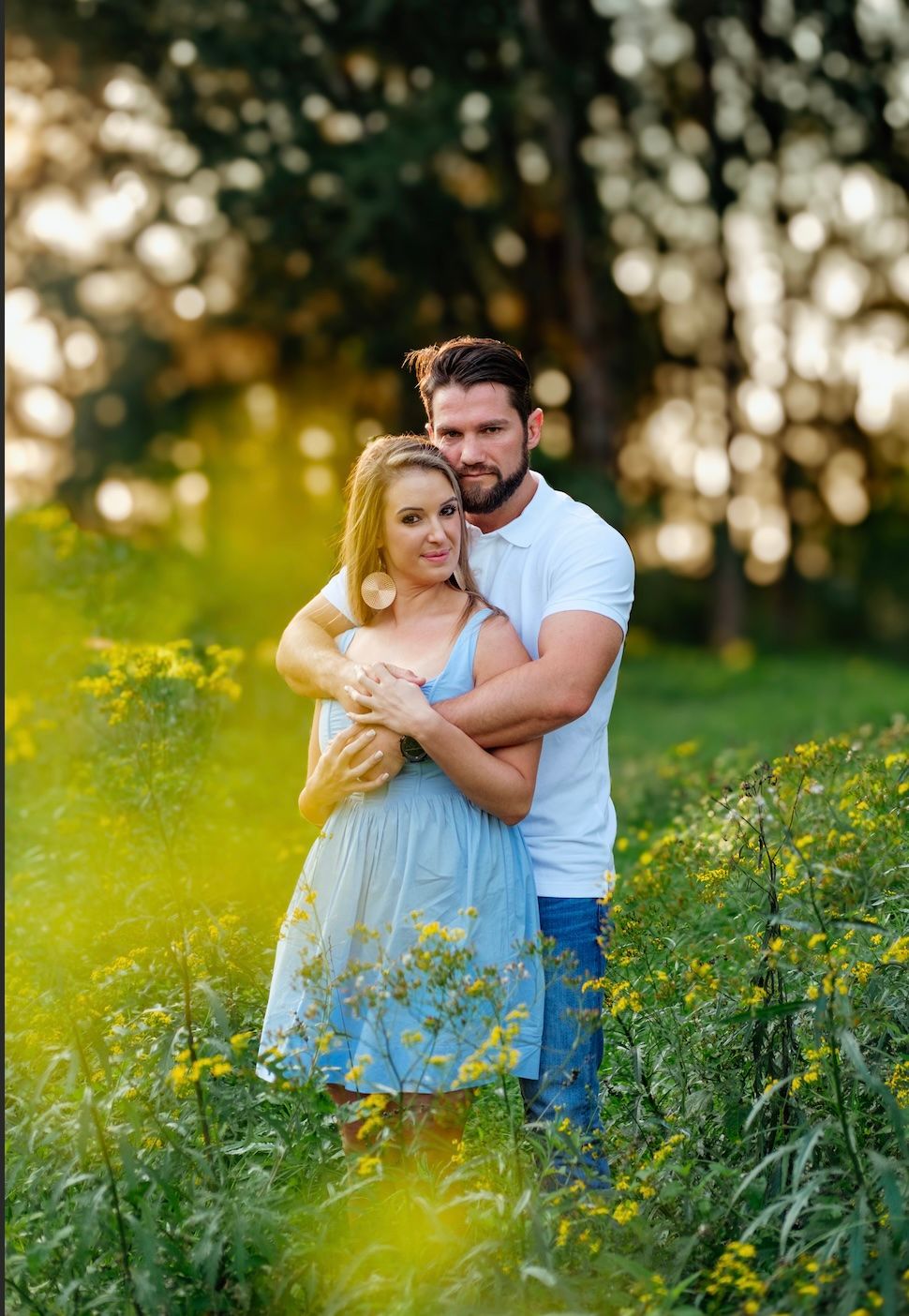 Couple portrait session in a forest with yellow flowers in Richards Bay