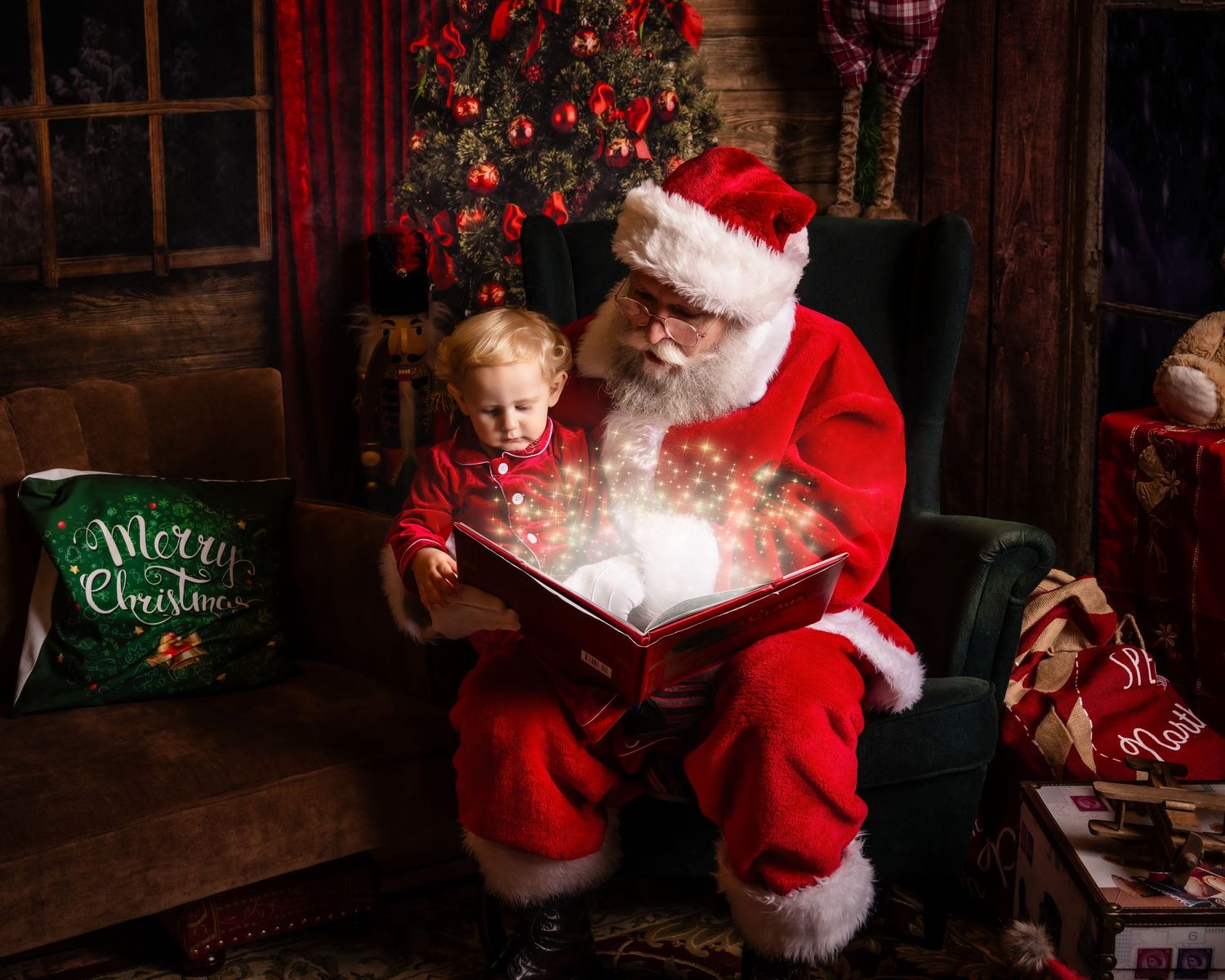 Santa Claus reading a magical glowing book in a cozy Christmas setting.