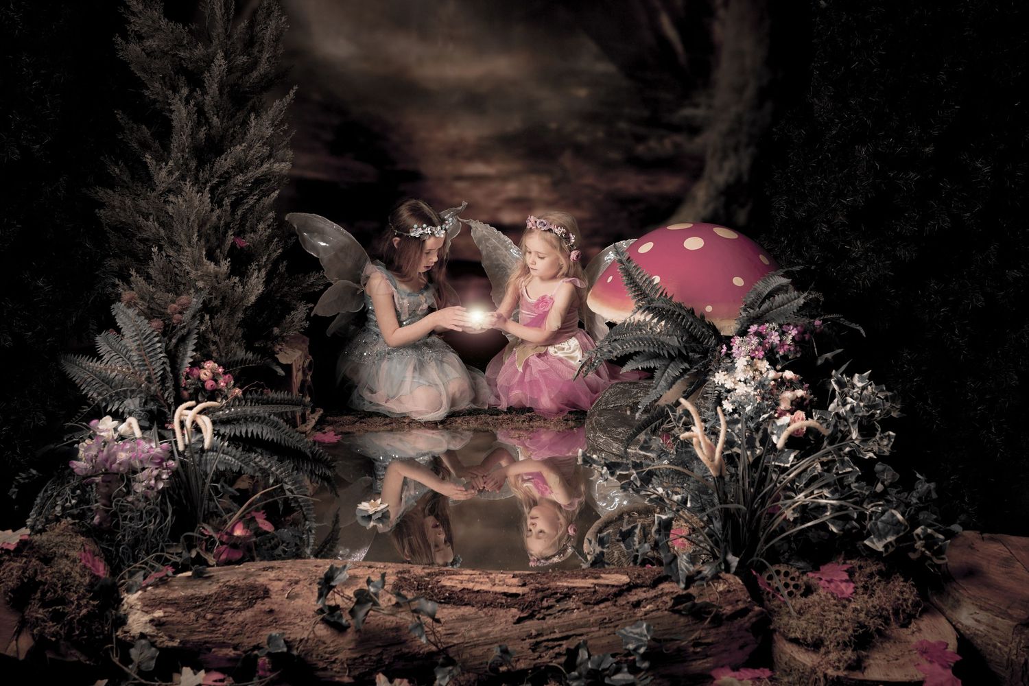 Magical fantasy scene with fairies sitting by a mystical pond surrounded by mushrooms and glowing lights.