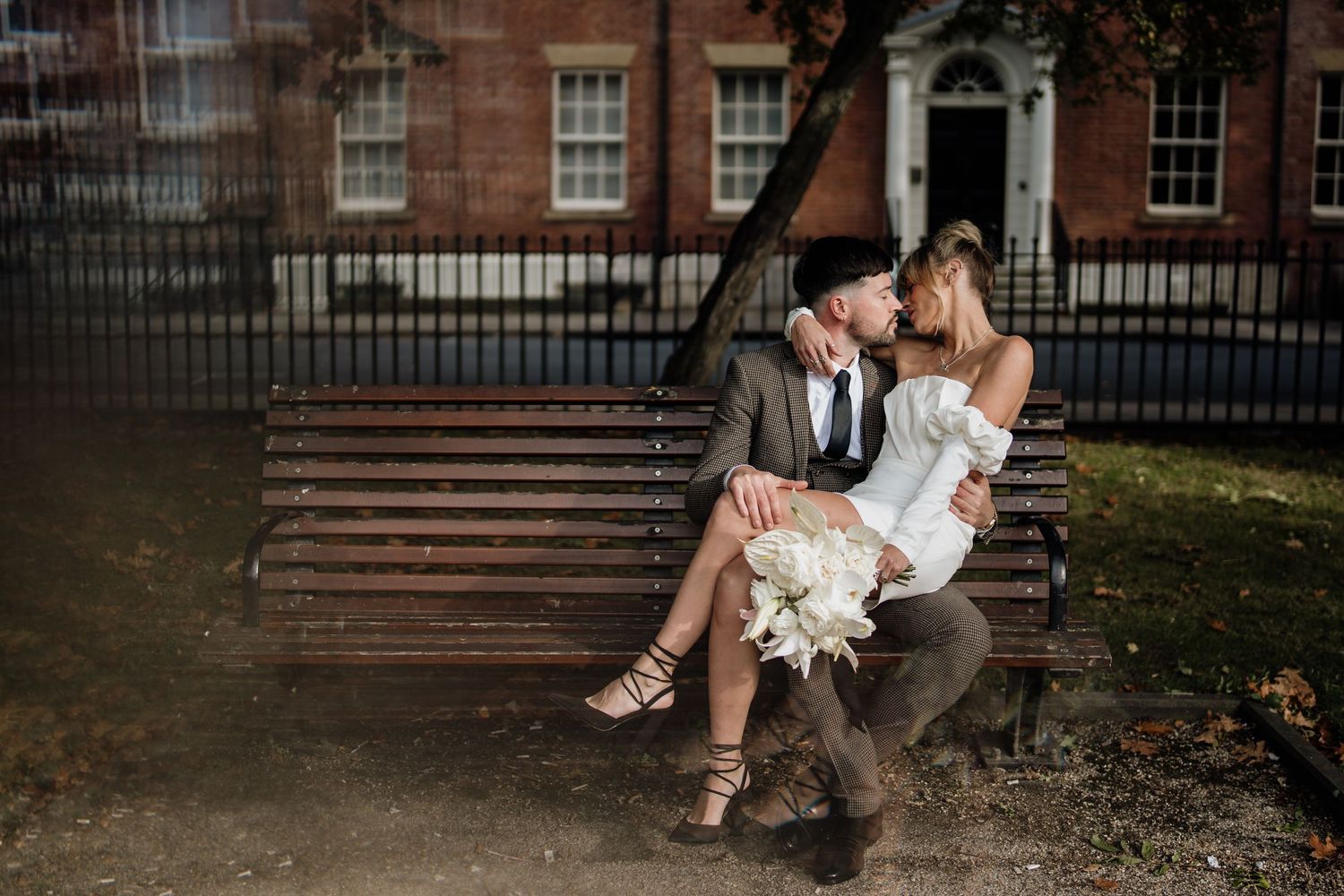 wedding couple on a bench
