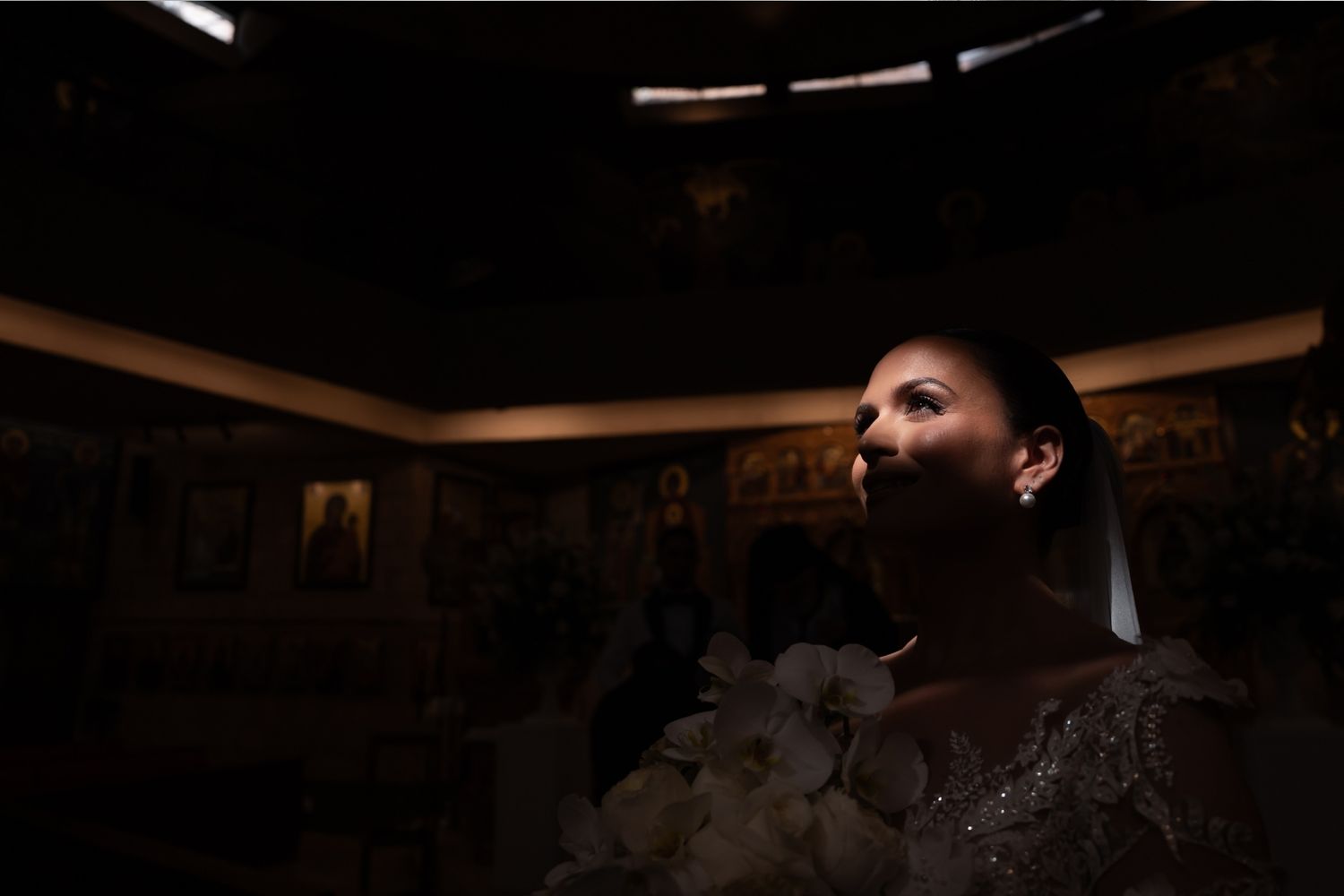 Moody interior scene with dramatic lighting and shadows in a dark room. - JCclick Wedding photo & Film - Best Cape Town Photographer.