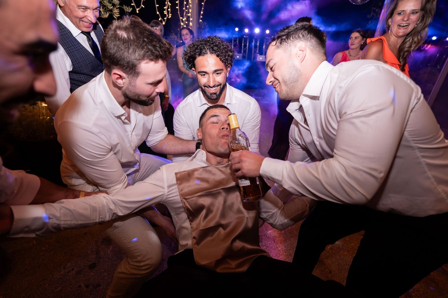 Wedding party dancing and celebrating on a dance floor- JCclick Wedding photo & Film - Best Cape Town Photographer.