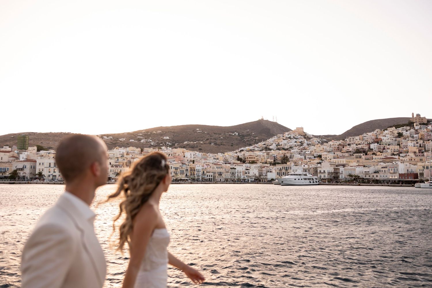 Scenic landscape in Siros, Greece, against Mediterranean waters. - JCclick Wedding photo & Film - Best Cape Town Photographer.