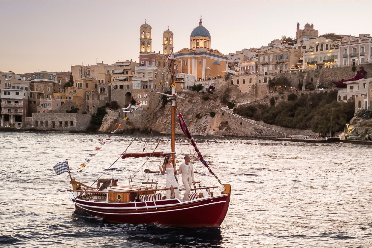 Wedding in Greece, Siros. A couple on a boat. - JCclick Wedding photo & Film - Best Cape Town Photographer.