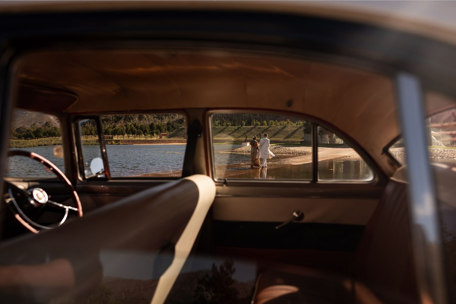 Vintage car interior view showing classic dashboard and steering wheel details. - JCclick Wedding photo & Film - Best Cape Town Photographer