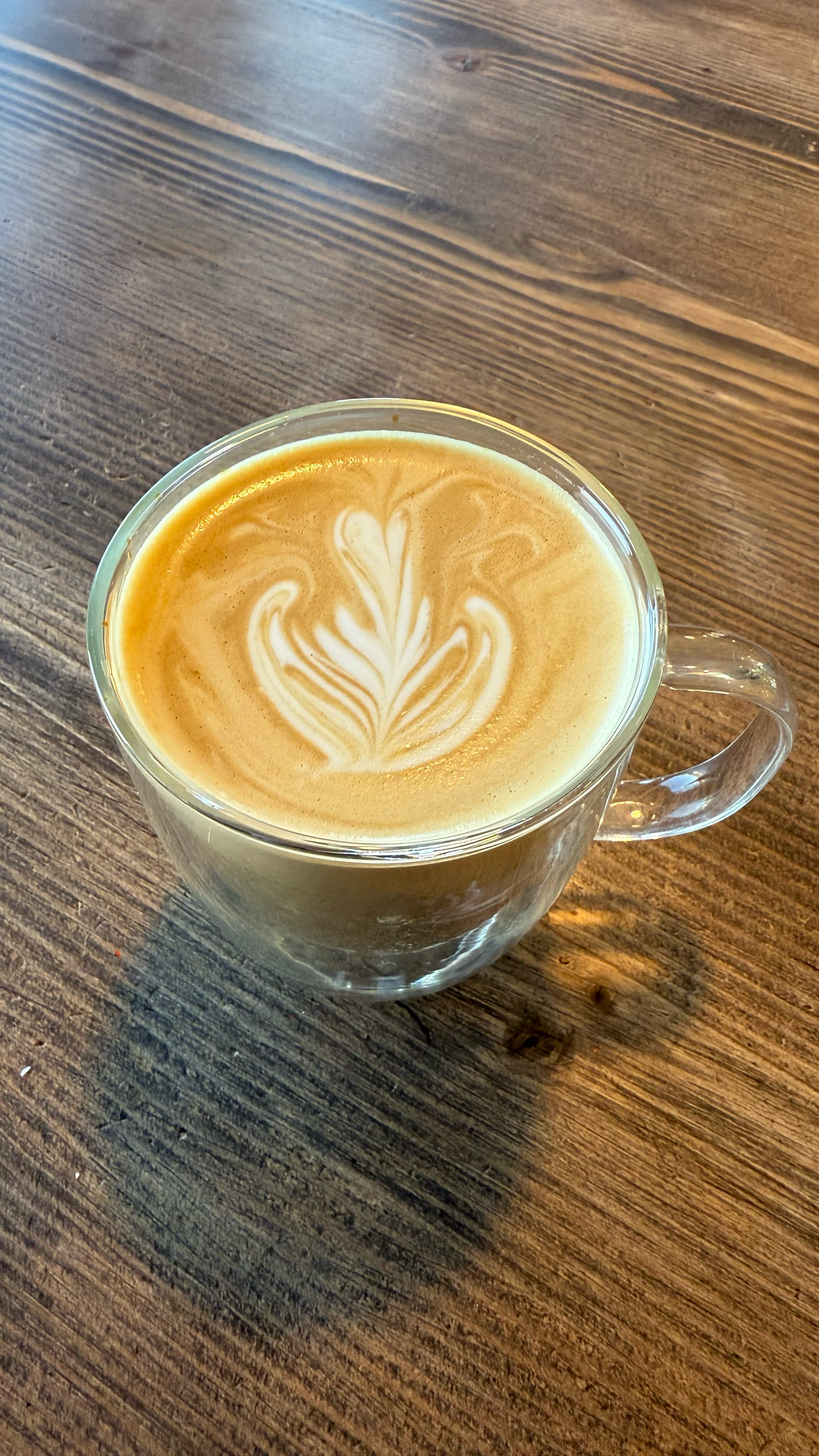 Latte made with small batch. Specialty coffee beans. Roasted weekly in Bartlett IL