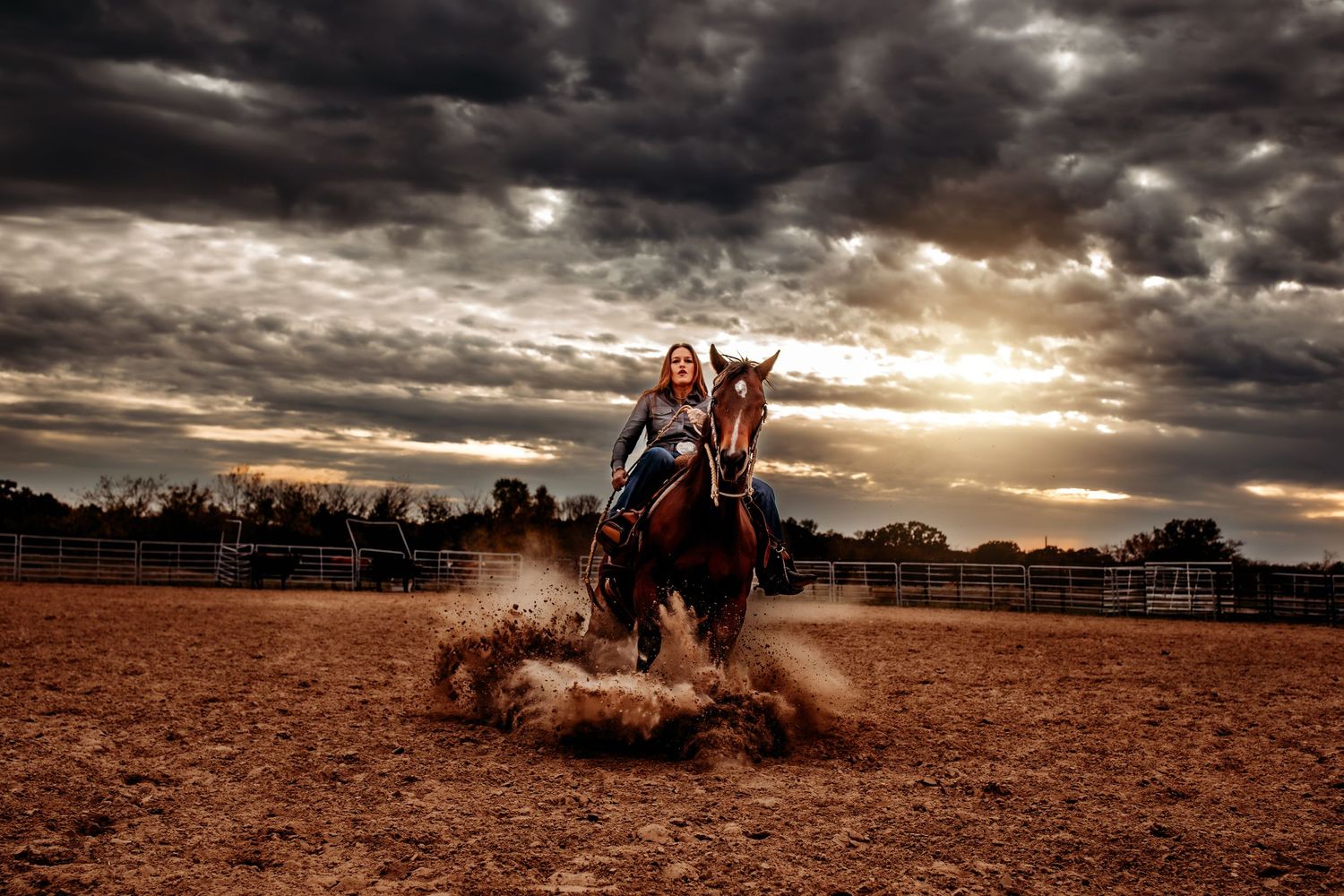 Dramatic dirt bike action sequence under stormy skies at sunset.