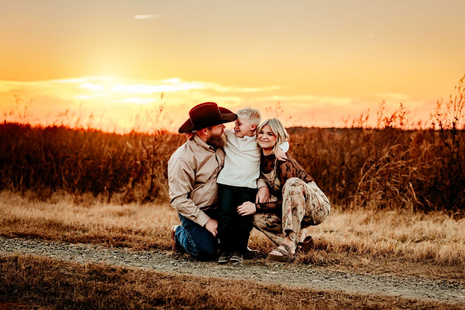 A family sits together  in Paris, Texas for a photo Session.