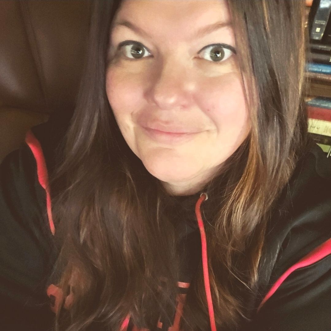 A series of selfies showing someone with long brown hair wearing a black hoodie with red drawstrings in various poses.