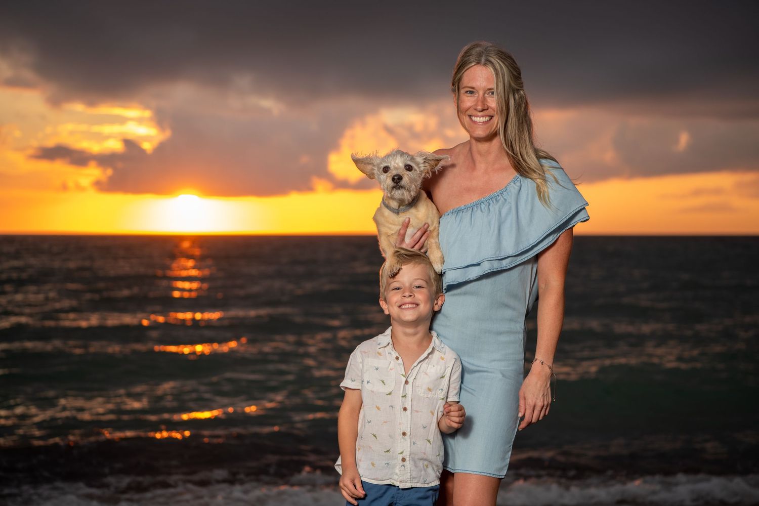 Beautiful sunset beach photography session with dramatic sky and ocean views. Beach photoshoot. Family photoshoot,
