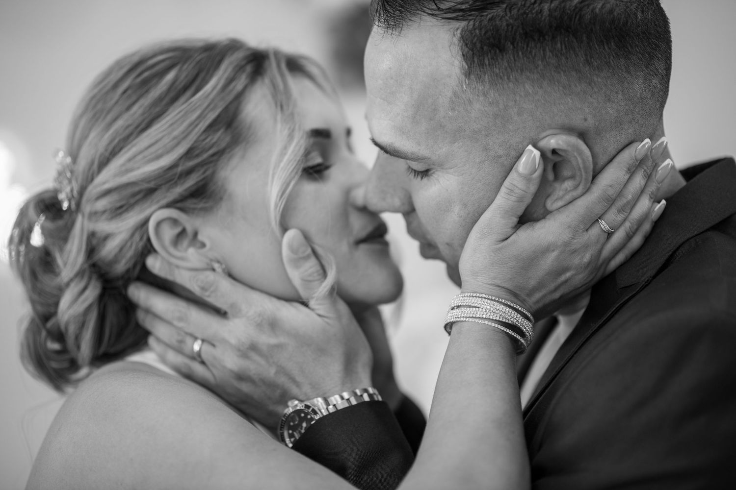 Black and white romantic wedding couple portraits showing intimate moments.