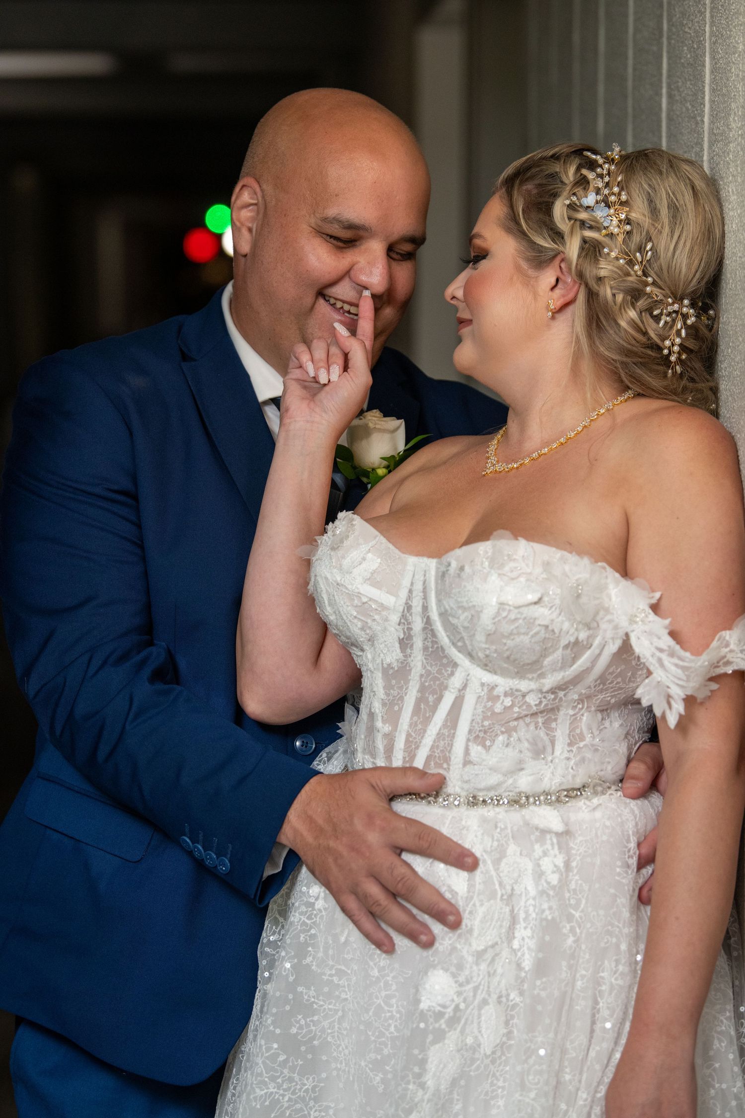 Series of tender moments between couple in wedding attire.