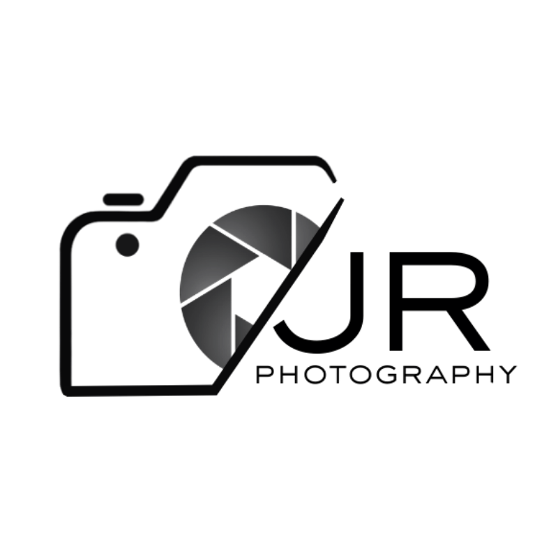 Minimalist black and white photography logo with abstract camera icon design.