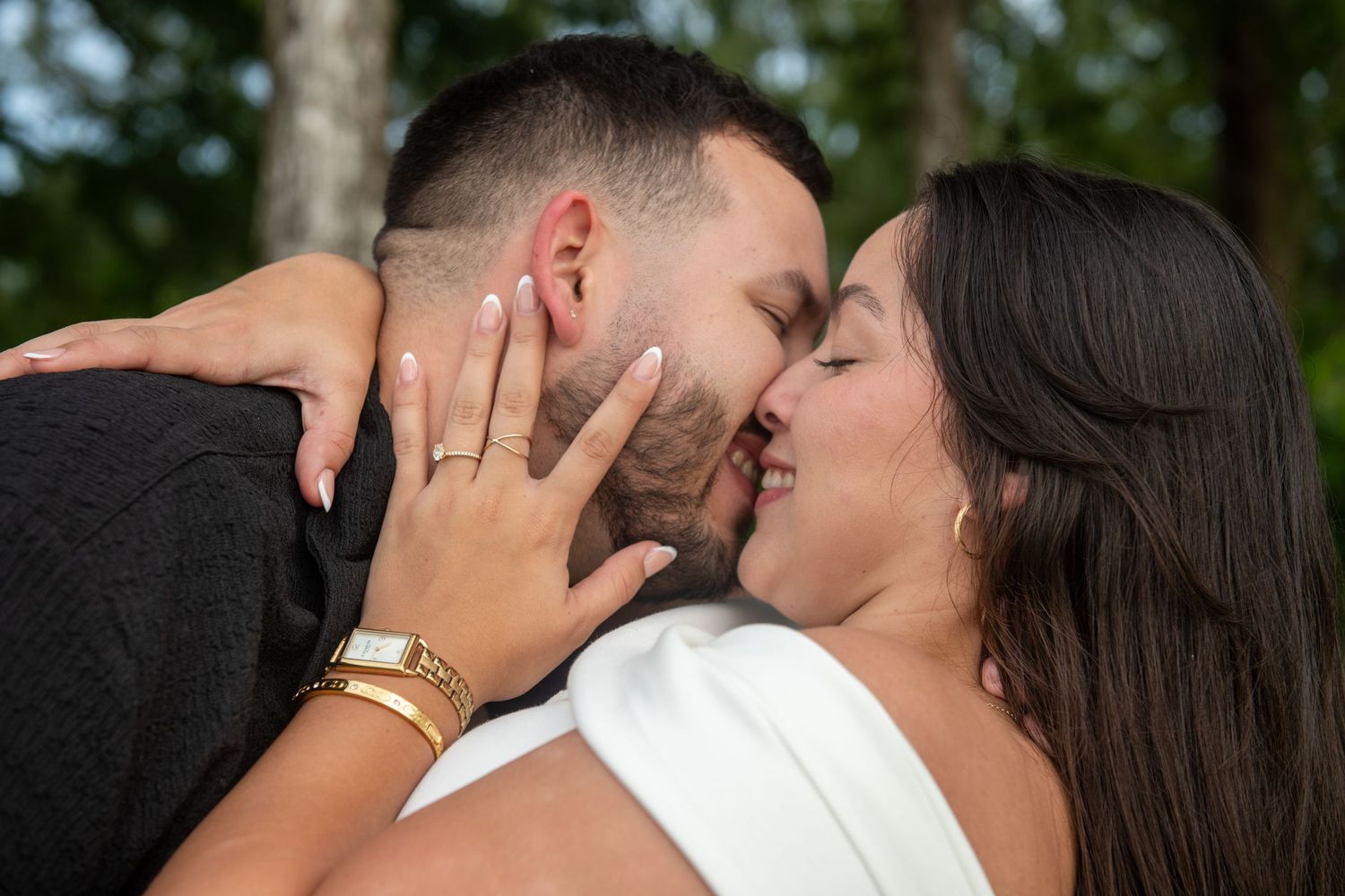 A romantic sequence of kissing moments captured in black and white photography.