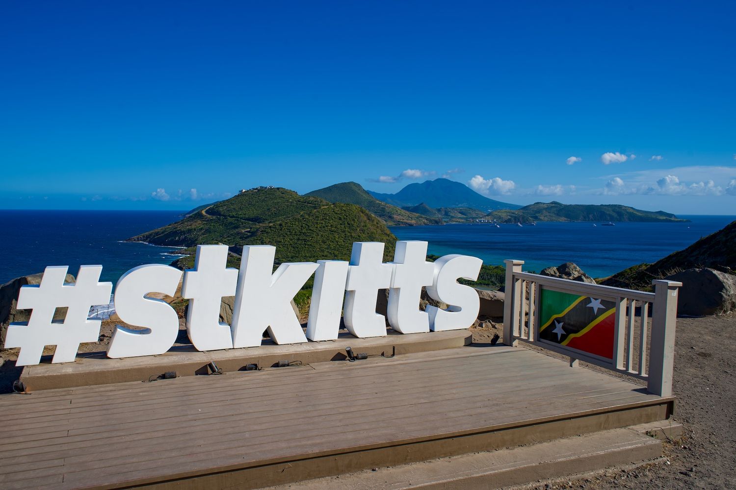 St. Kitts sign at Timothy Hill. Stop here on the best St. Kitts Tours with St. Kitts Cruise Photography.