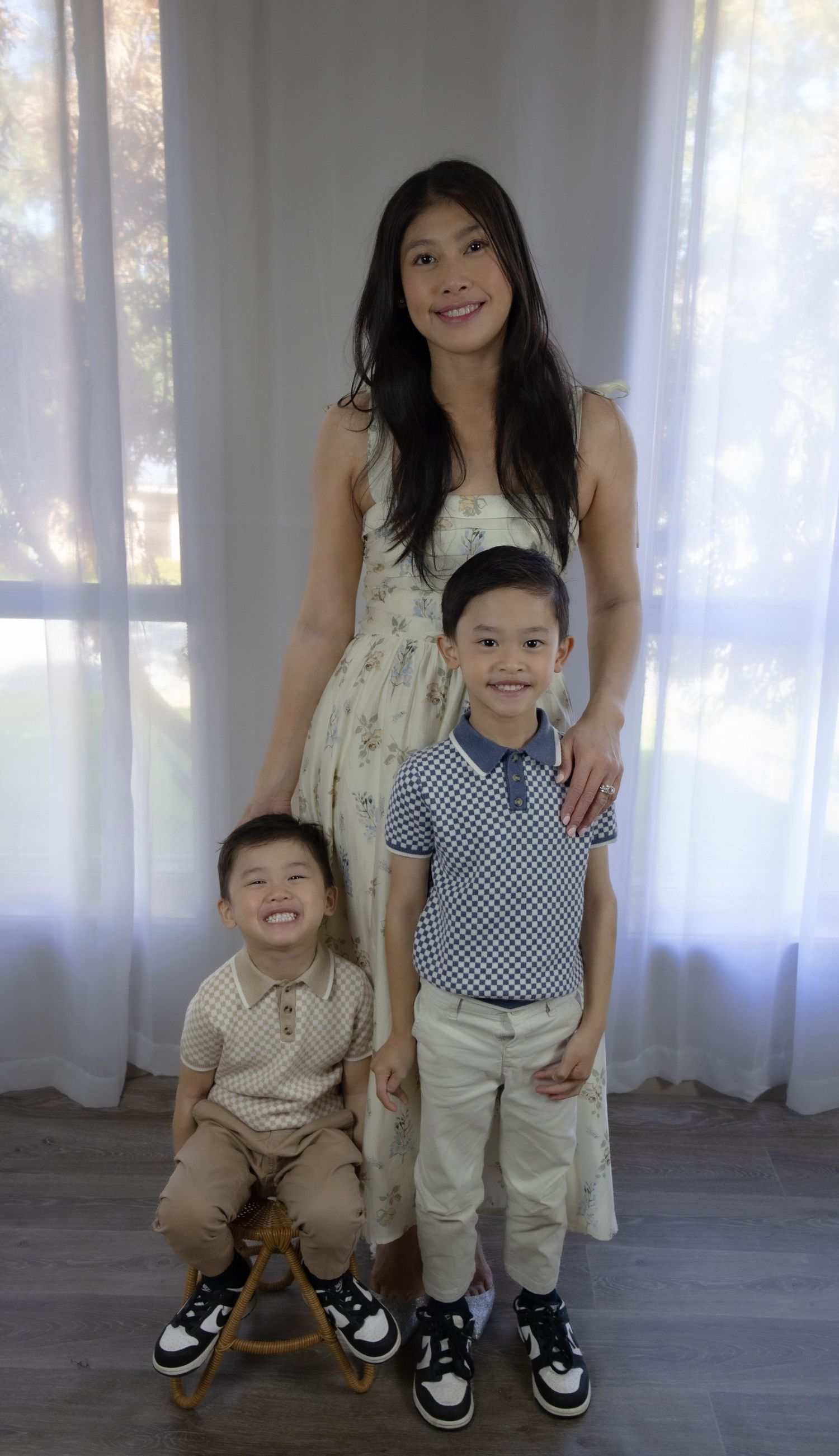 Mum with two young smiling boys during family photography session in Albury.