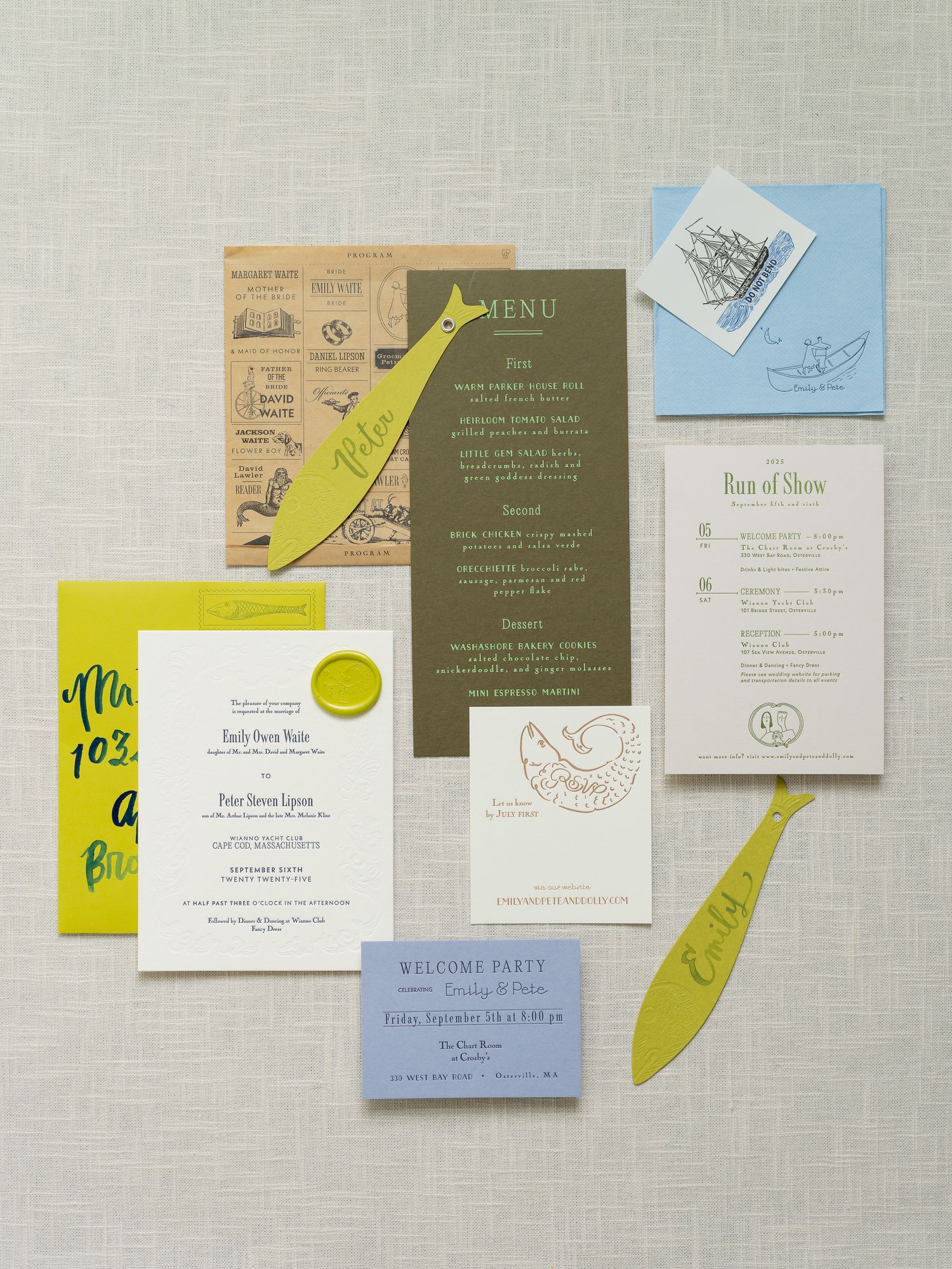 Nautical-themed wedding stationery suite featuring menus, invitations, and programs in yellow, blue, and olive green.