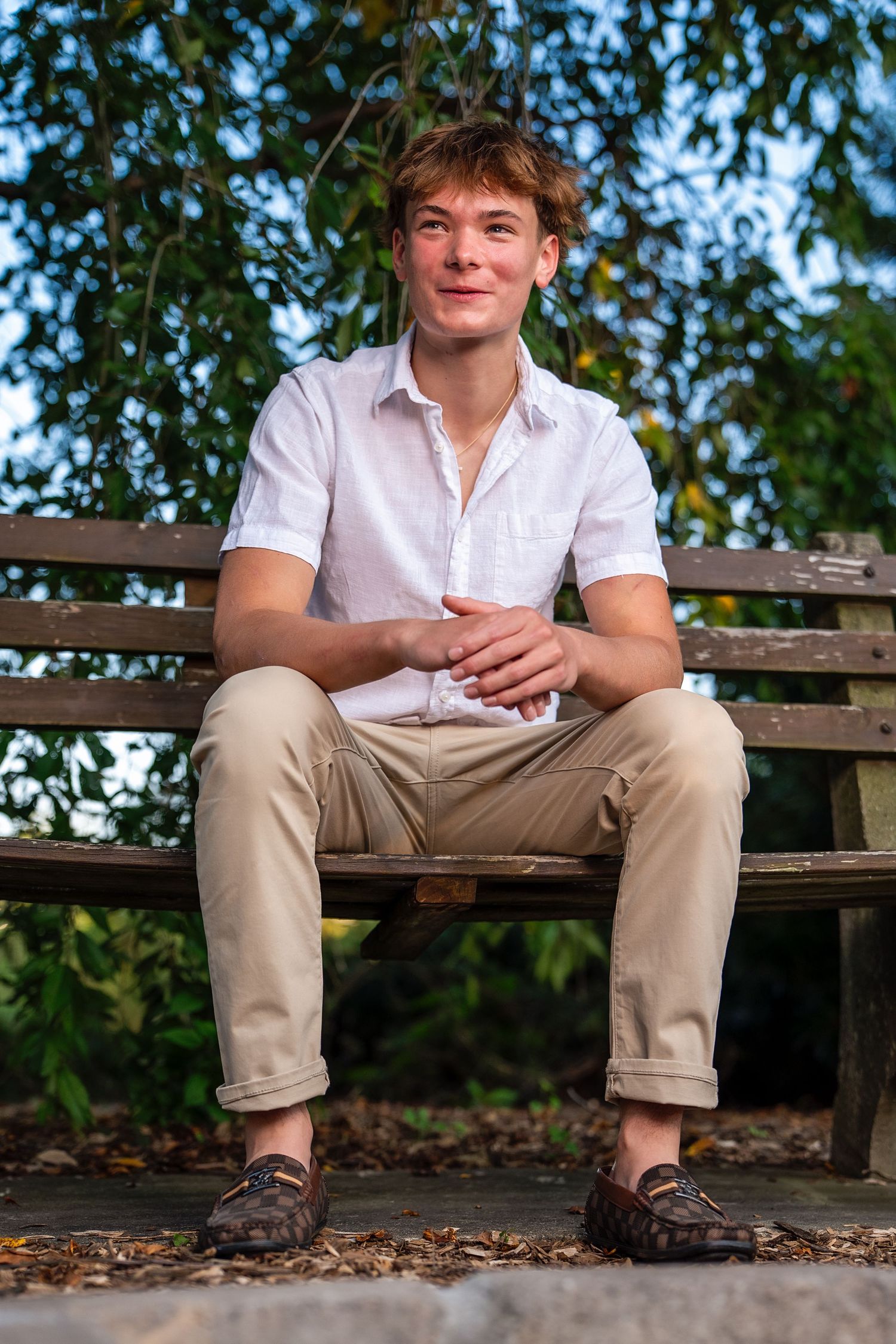 senior sitting on bench