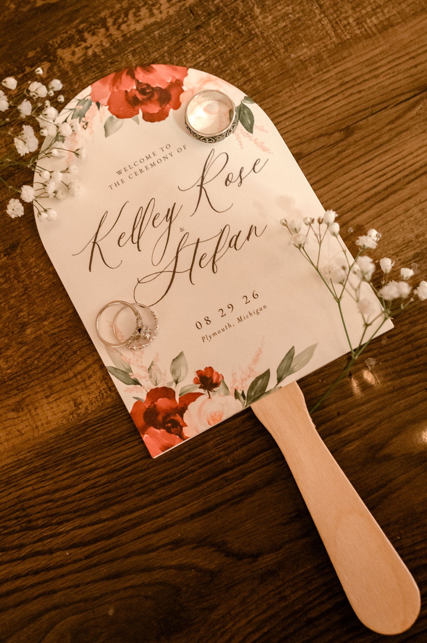Floral wedding ceremony fan program for Kelley Rose and Stefan dated 08.29.26 in Plymouth, Michigan.