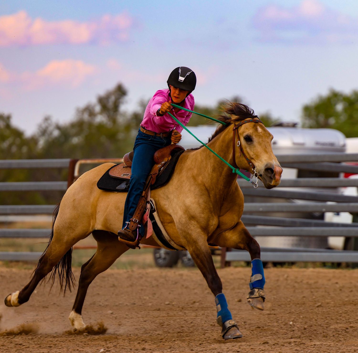 A series of photos showing a horse bucking and attempting to throw off its rider during a rodeo event.