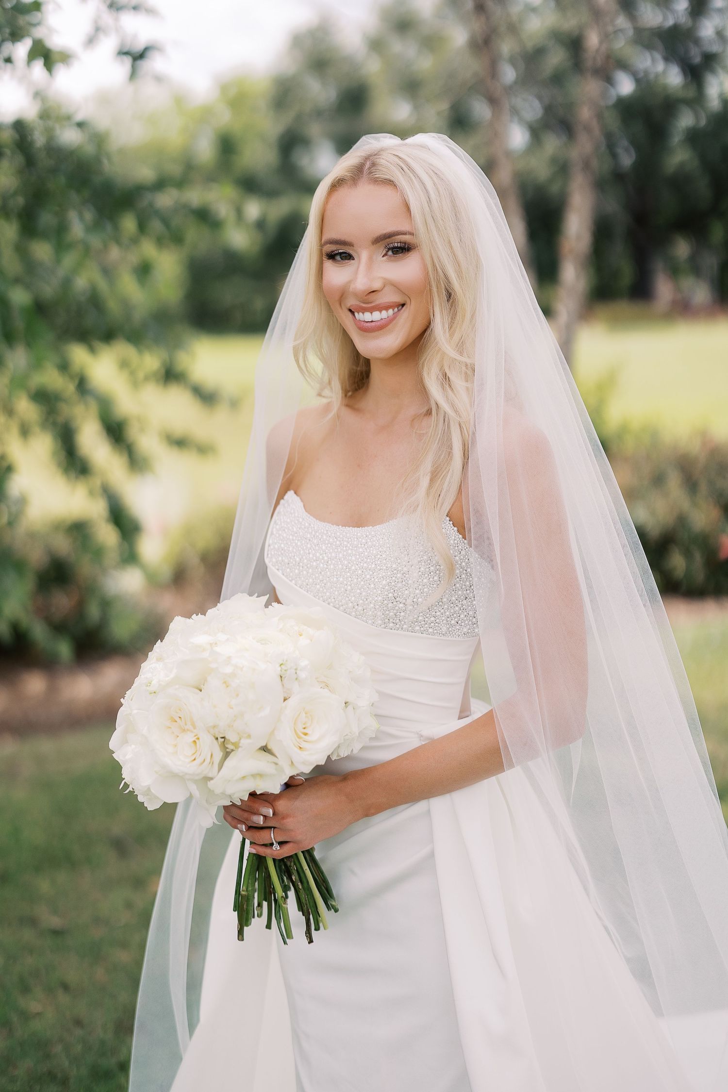 Series of elegant bridal portraits outdoors with white bouquet and flowing veil in natural lighting.