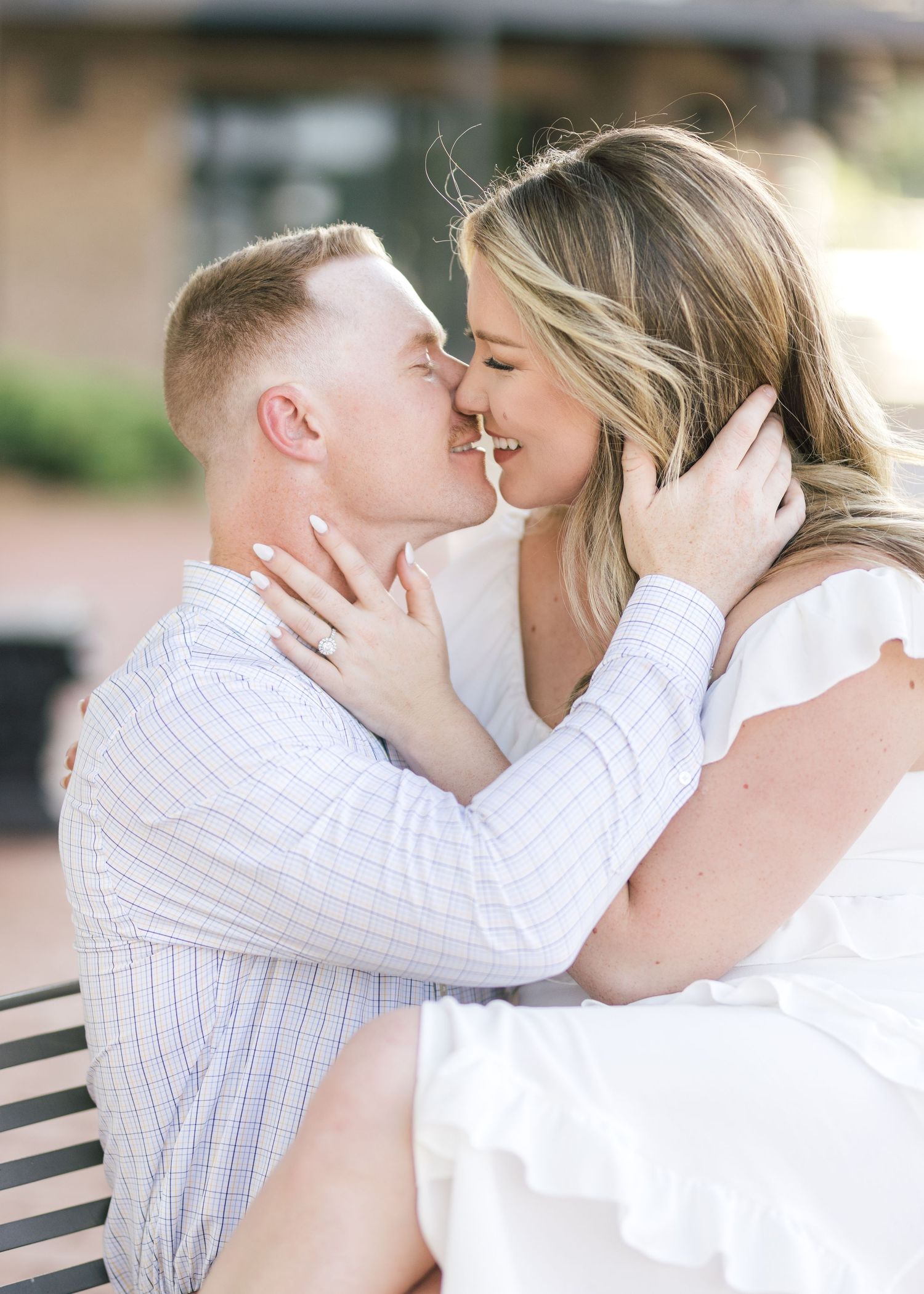 Romantic couple in white and casual attire sharing intimate kisses in a series of outdoor photos.