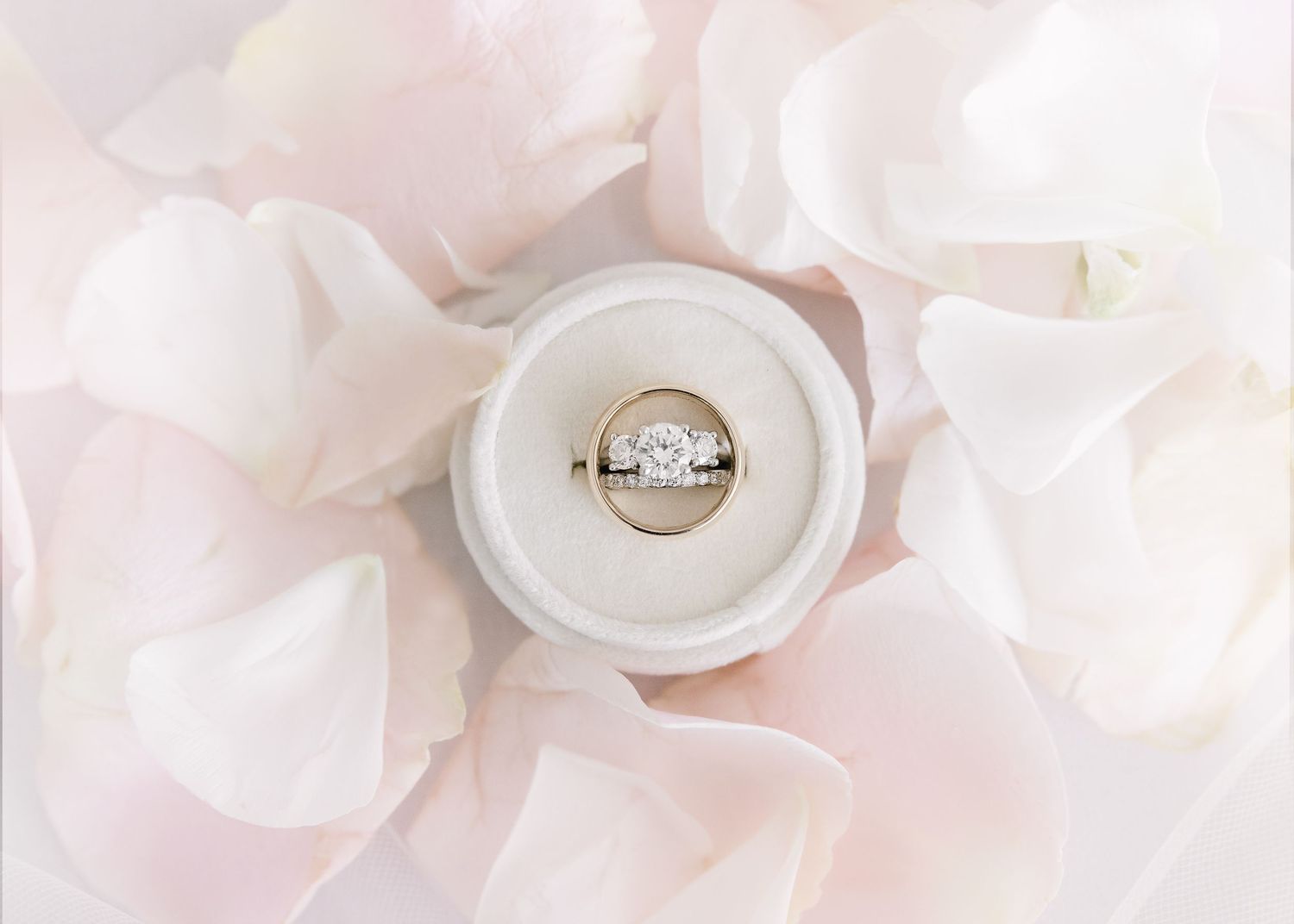 Delicate white and pink floral details arranged in an ethereal wedding theme.