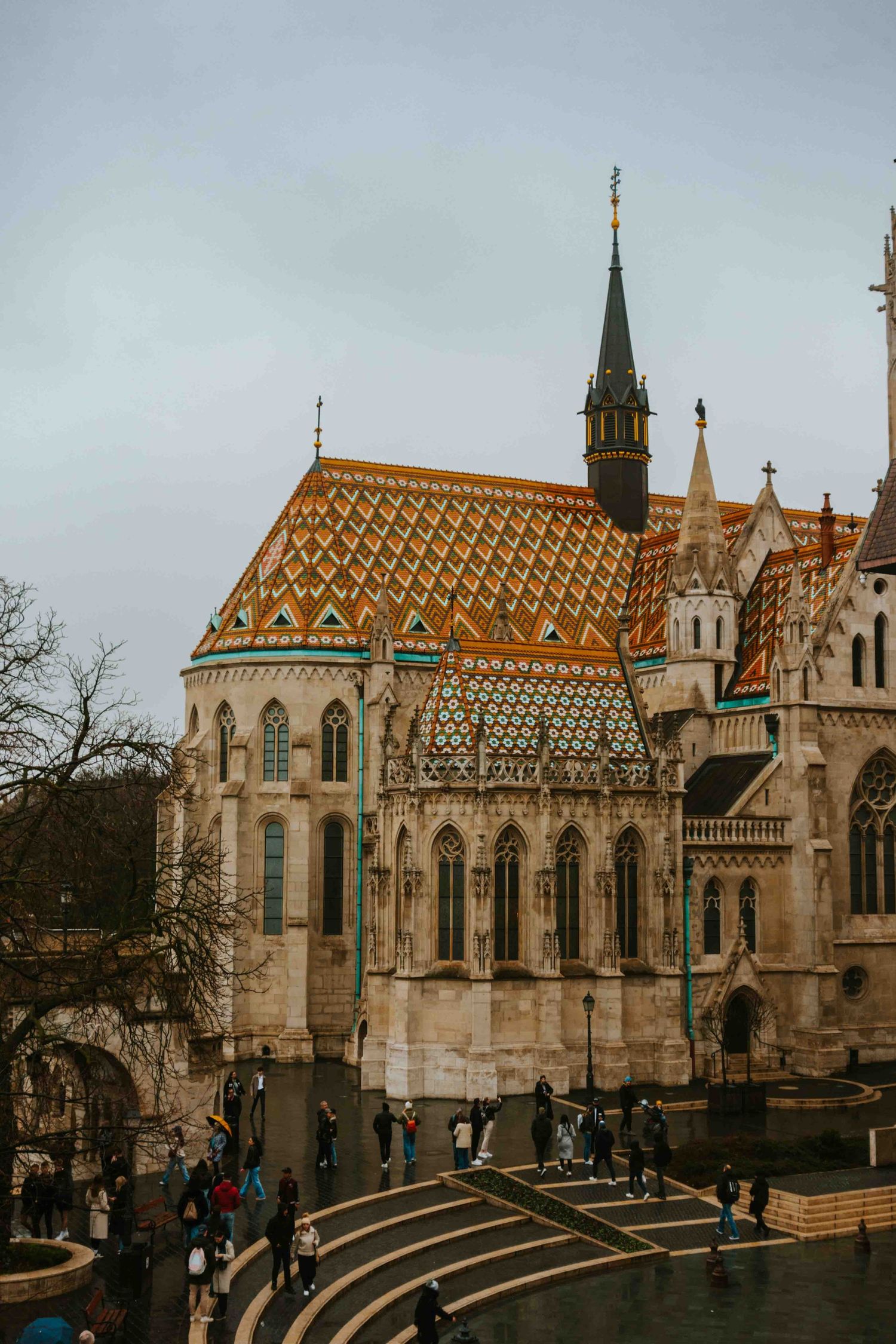 Matthias Church in Budapest features ornate Gothic architecture with its distinctive colorful tiled roof pattern and spires.